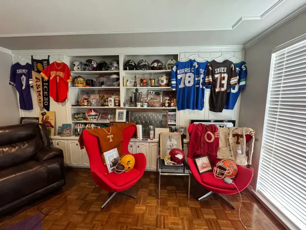 Sell vintage sports memorabilia in San Antonio Tx — a clean unbroken junction where the finished work meets the ceiling line